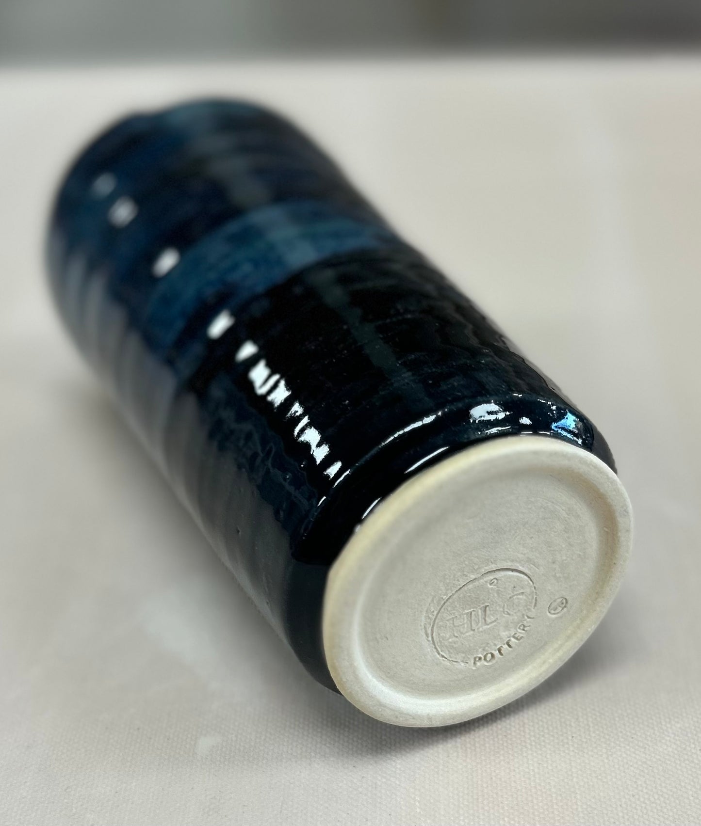 Black and blue travel tumbler