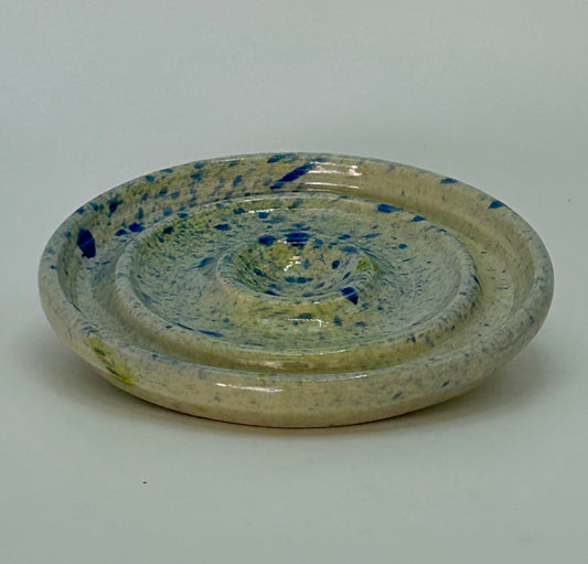 Splatter soap dish