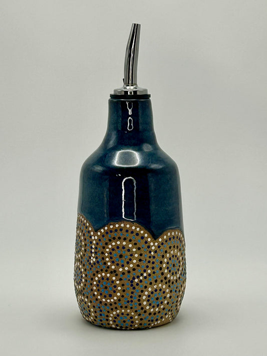 Blue circles oil bottle